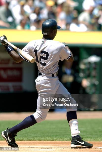 Alfonso Soriano of the New York Yankees bats against the Oakland Athletics during a Major League Baseball game May 11, 2003 at the Oakland-Alameda...