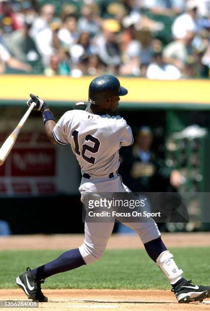 Alfonso Soriano of the New York Yankees bats against the Oakland Athletics during a Major League Baseball game May 11, 2003 at the Oakland-Alameda...