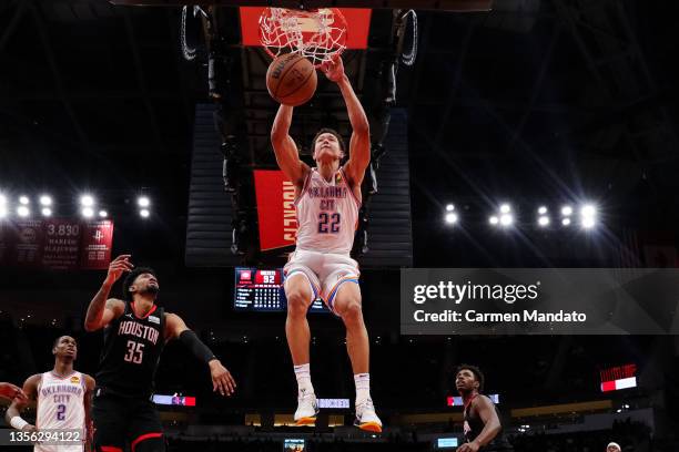 Isaiah Roby of the Oklahoma City Thunder dunks the ball during the second half against the Houston Rockets at Toyota Center on November 29, 2021 in...