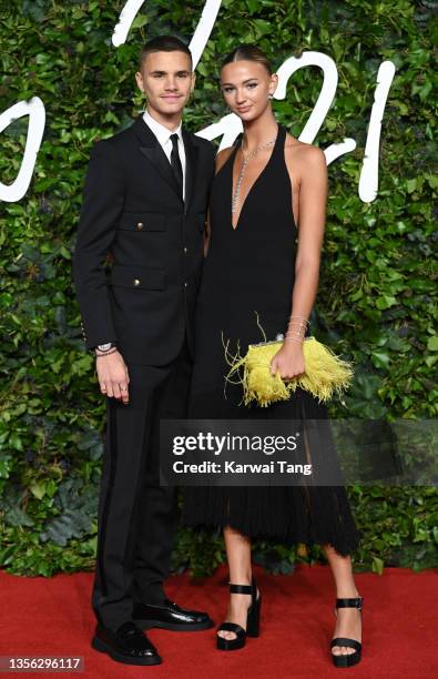 Romeo Beckham and Mia Regan attend The Fashion Awards 2021 at the Royal Albert Hall on November 29, 2021 in London, England.