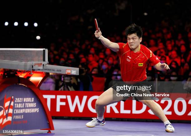 Fan Zhendong of China competes during the men's singles finals match against Truls Moregard of Sweden on day seven of the 2021 ITTF World Table...