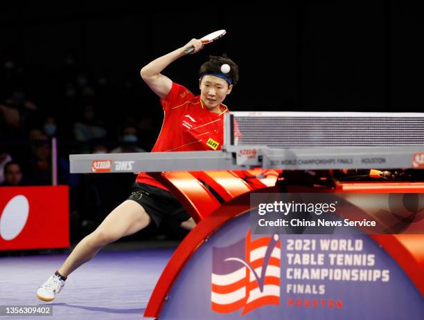 Wang Manyu of China returns a shot against Sun Yingsha of China during the women's singles finals match on day seven of the 2021 ITTF World Table...