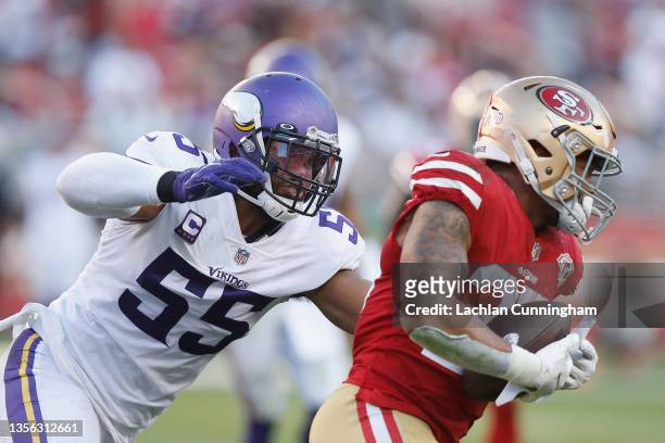 Anthony Barr of the Minnesota Vikings tackles Elijah Mitchell of the San Francisco 49ers in the third quarter at Levi's Stadium on November 28, 2021...