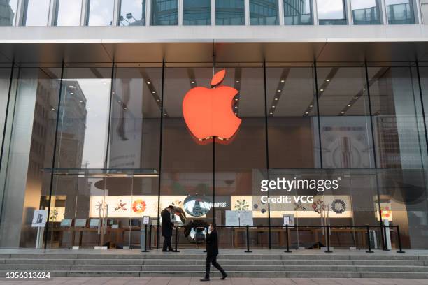 The logo of an Apple store turns red for the World AIDS Day on November 30, 2021 in Shanghai, China. World AIDS Day falls on December 1 every year.
