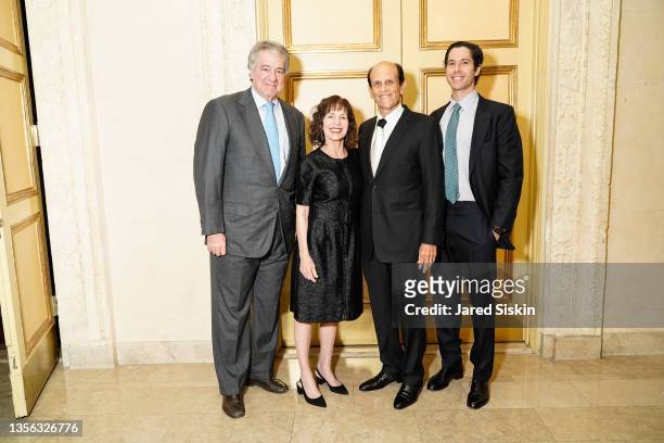 Guest, Lori Anne Milken, Michael Milken and Thomas Johnson attend Prostate Cancer Research Foundation's 25th New York Dinner at The Plaza on November...
