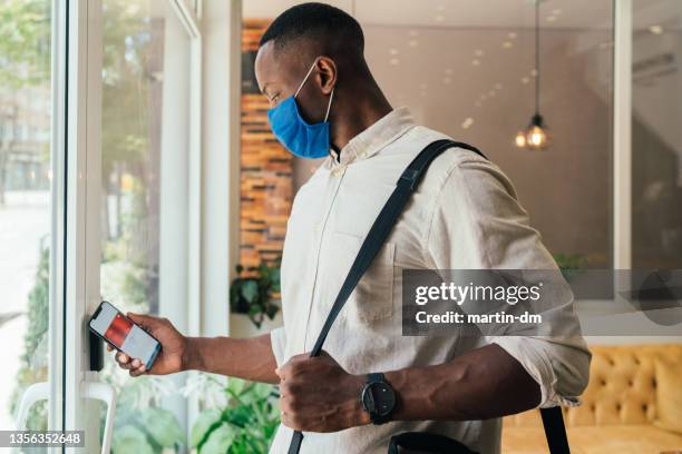 safety in the office during covid-19 pandemic - leaving card stock pictures, royalty-free photos & images