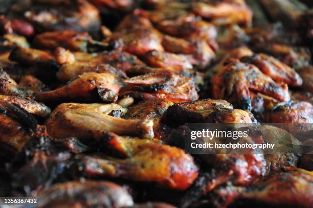 jerk chicken - jamaican culture stock-fotos und bilder