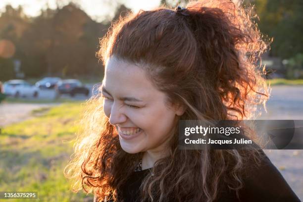 happy woman laughing - nordafrikanischer abstammung stock-fotos und bilder