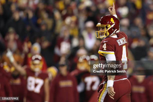 Taylor Heinicke of the Washington Football Team celebrates after a touchdown against the Seattle Seahawks during the third quarter at FedExField on...