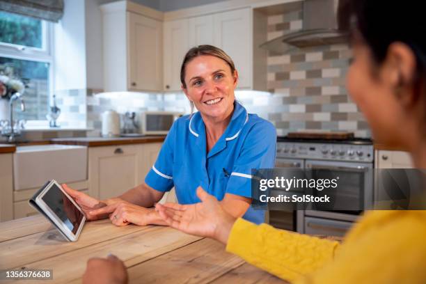 lending her expertise - nhs england stock pictures, royalty-free photos & images