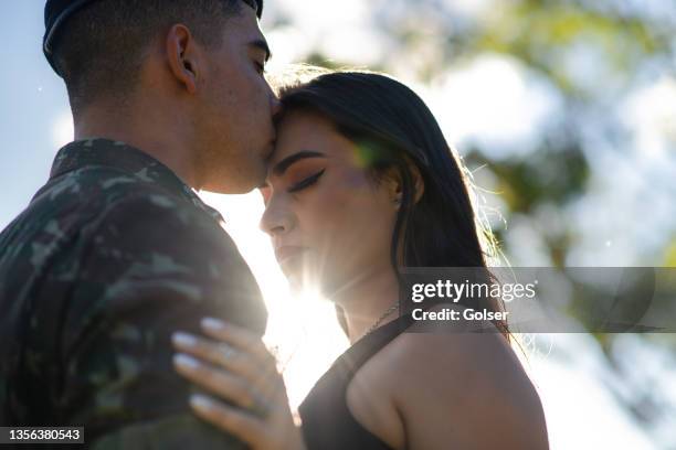 farewell to soldier and girlfriend. - military spouse stock pictures, royalty-free photos & images