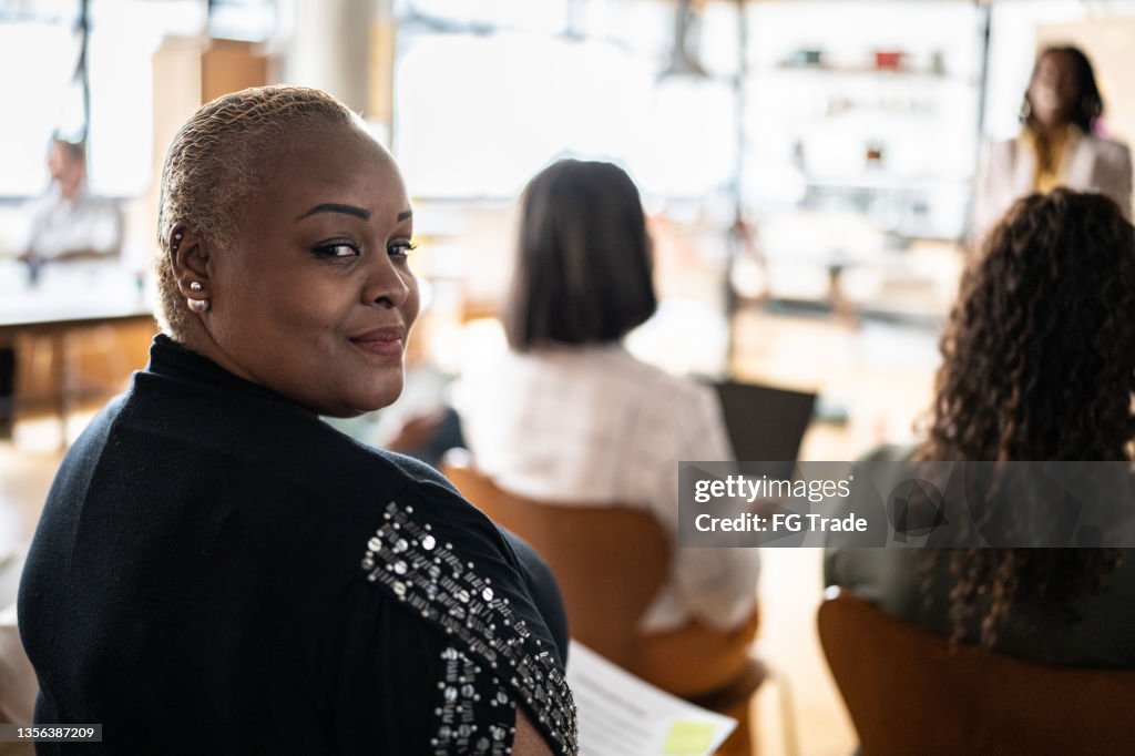 Portrait of a woman in a business conference