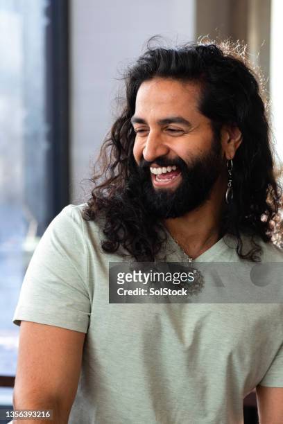 laughing portrait - long hair male stock pictures, royalty-free photos & images