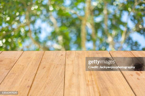 close-up of wooden table and green natural blur abstract background - colorful vegetables summer stock pictures, royalty-free photos & images