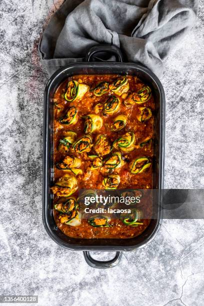 zucchini rolls in baking dish - baking dish stock pictures, royalty-free photos & images