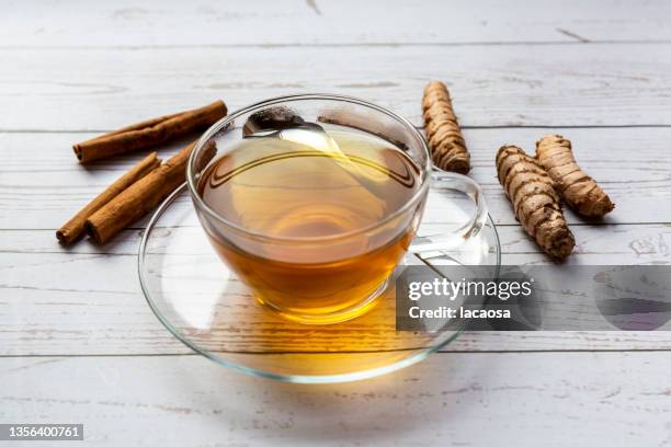 cup of tea with turmeric and cinnamon - kurkuma ストックフォトと画像