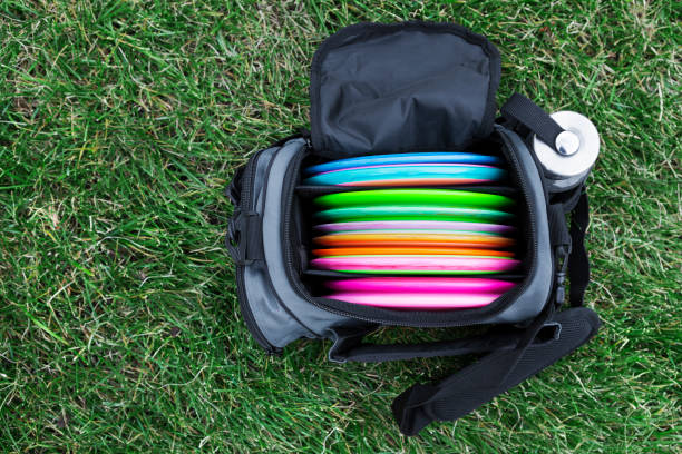 bag of disc golf flying discs - disc golf stock pictures, royalty-free photos & images