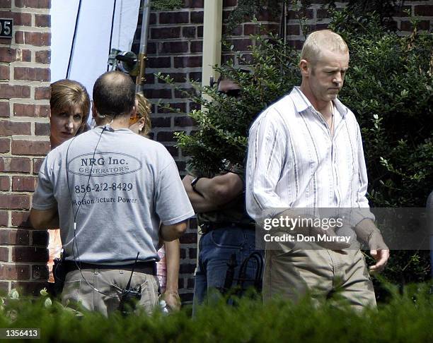 Actor David Morse walks on the set of his new television drama "Hack" August 27, 2002 in Philadelphia, Pennsylvania. "Hack" will premiere on CBS...