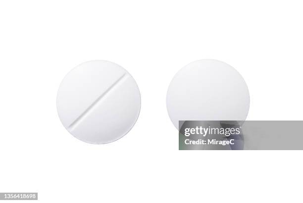 white pills isolated on white - piller bildbanksfoton och bilder