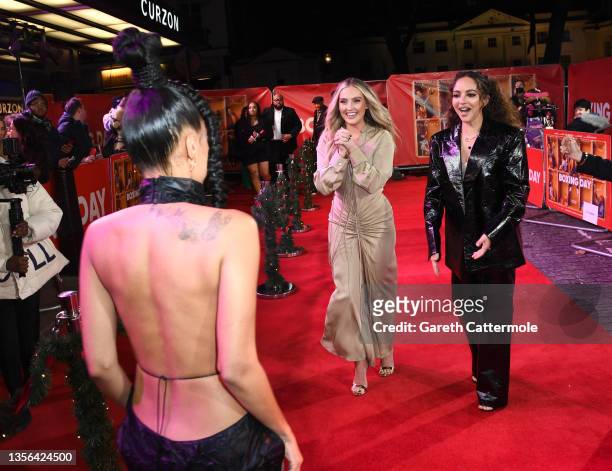 Perrie Edwards and Jade Thirlwall greet Leigh-Anne Pinnock at the "Boxing Day" World Premiere at The Curzon Mayfair on November 30, 2021 in London,...