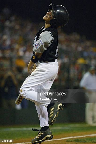 Patton Eagle of Southwest reacts after he strikes out against Great Lakes during the Little League Semifinals at Lamade Stadium in Williamsport,...