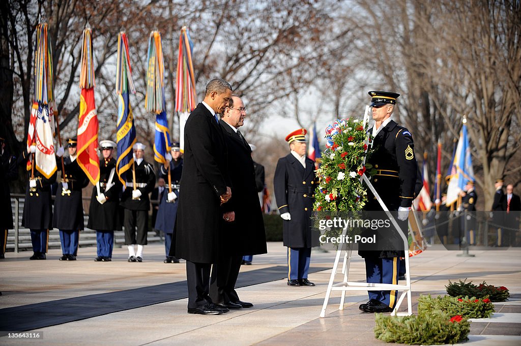 Obama And Iraqi Prime Minister Nouri Al-Maliki Lay Wreath At Arlington