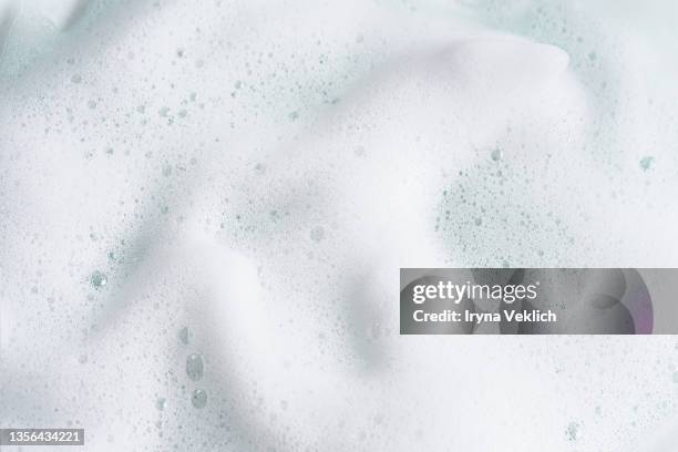 macrophotography of  beauty product foam soap. - seifenblasen stock-fotos und bilder