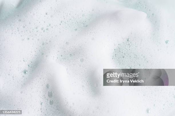 macrophotography of  beauty product foam soap. - hand white background stock pictures, royalty-free photos & images