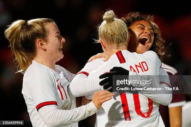 Jess Carter of England celebrates with team mates after scoring their side's 11th goal during the FIFA Women's World Cup 2023 Qualifier group D match...