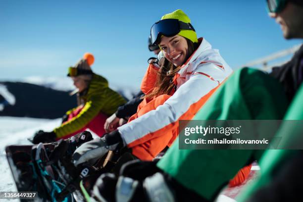 she loves her winter holidays - snowboard imagens e fotografias de stock