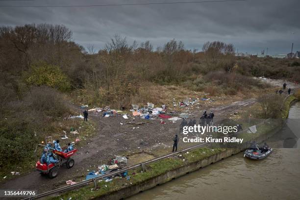 Police and Municipal workers clear the Grande-Synthe migrant camp and evict all those staying there in the latest attempt to disperse migrants from...