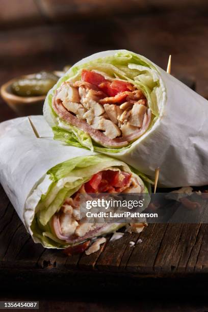 roast chicken blt lettuce wrap sandwich - wrap sandwich stock pictures, royalty-free photos & images