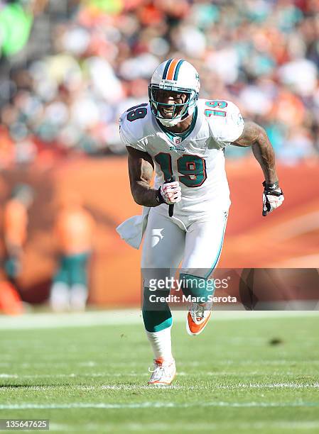 Receiver Brandon Marshall of the Miami Dolphins runs a route against the Philadelphia Eagles at Sun Life Stadium on December 11, 2011 in Miami...