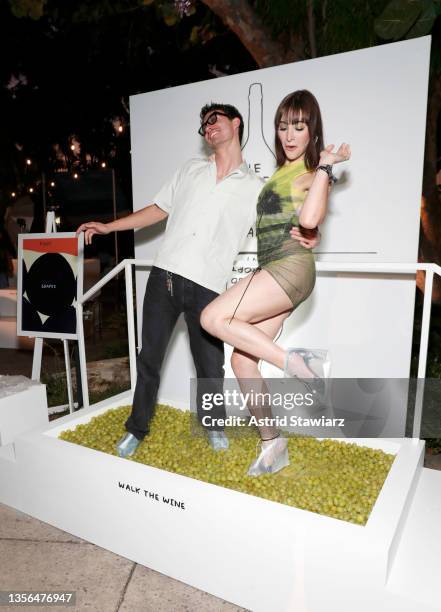 Jacob Bixenman and Hari Nef and attend Unconventional Bubbles with Ruinart + David Shrigley on November 30, 2021 in Miami, Florida.