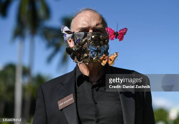 Lynx Alexander is seen wearing a butterfly art piece mask outside Art Basel on November 30, 2021 in Miami, Florida.