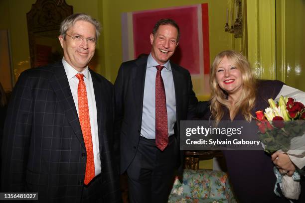 Andrew Young, Bruce Addison and Emily Eerdmans attend Eerdmans New York Holiday Bazaar Opening at Eerdmans New York on November 30, 2021 in New York...