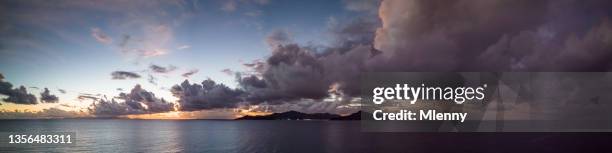 seychelles praslin island dramatic sunset sky panorama - open sky stockfoto's en -beelden