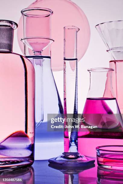 chemistry equipment against white background - pallone di vetro foto e immagini stock