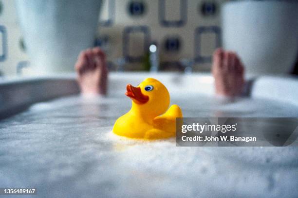 bath with rubber duck - rubber ストックフォトと画像