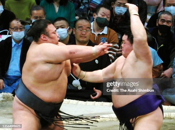 Ozeki Takakeisho and sekiwake Meisei compete on day ten of the Grand Sumo Kyushu Tournament at the Fukuoka Convention Center on November 23, 2021 in...