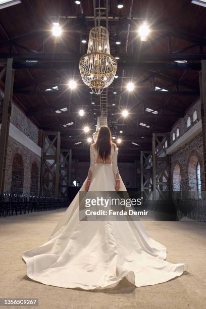 Model prepares at Hakan Akkaya x Cinderella Bridal Capsule Collection at Tersane Istanbul on November 30, 2021 in Istanbul, Turkey.