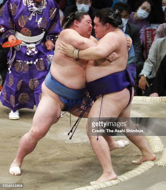 Ozeki Shodai pushes sekiwake Meisei out of the ring to win on day eleven of the Grand Sumo Kyushu Tournament at the Fukuoka Convention Center on...