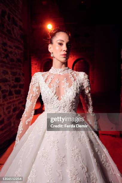 Model poses backstage at Hakan Akkaya x Cinderella Bridal Capsule Collection at Tersane Istanbul on November 30, 2021 in Istanbul, Turkey.