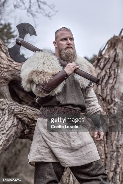 viking warrior king in a forest - viking stock pictures, royalty-free photos & images