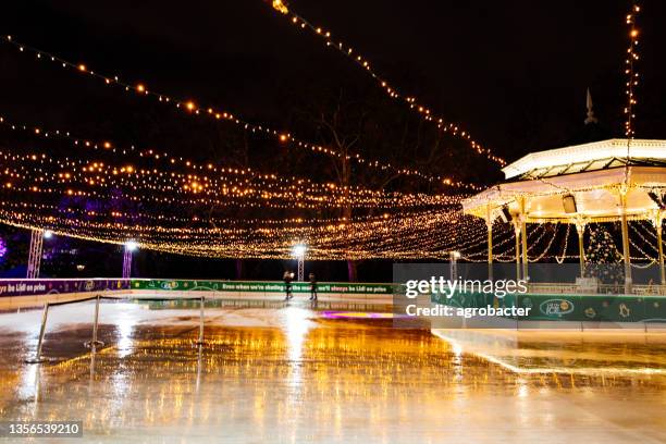 ice skating at winter wonderland, london, uk - ice rink uk stock pictures, royalty-free photos & images