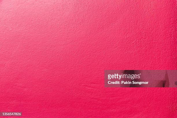 pink color old grunge wall concrete texture as background. - pink wall stock-fotos und bilder