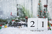 Winter Solstice. White wood calendar blocks with the date December 21st.
