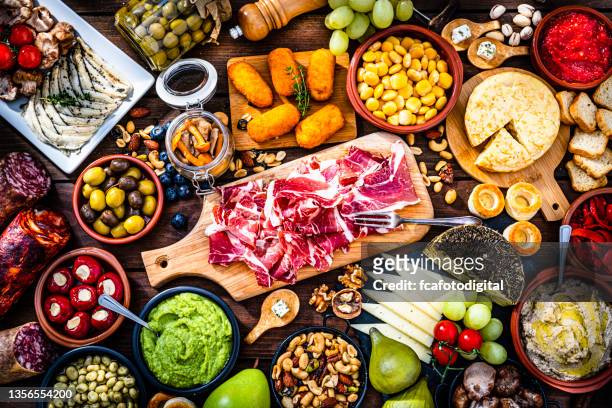 serrano ham and delicious spanish tapas - tapas stock pictures, royalty-free photos & images