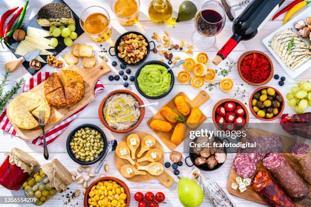 spanish tapas, beer and wine on white table - spanish culture stock pictures, royalty-free photos & images