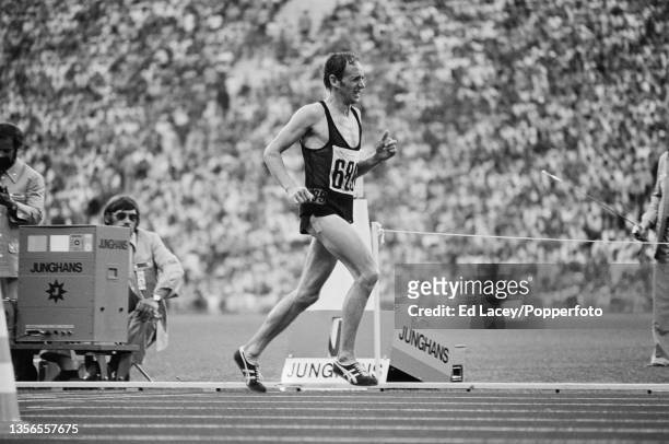 Long distance runner Jack Foster competes for the New Zealand team to finish in 8th place in the Men's marathon event at the 1972 Summer Olympics...
